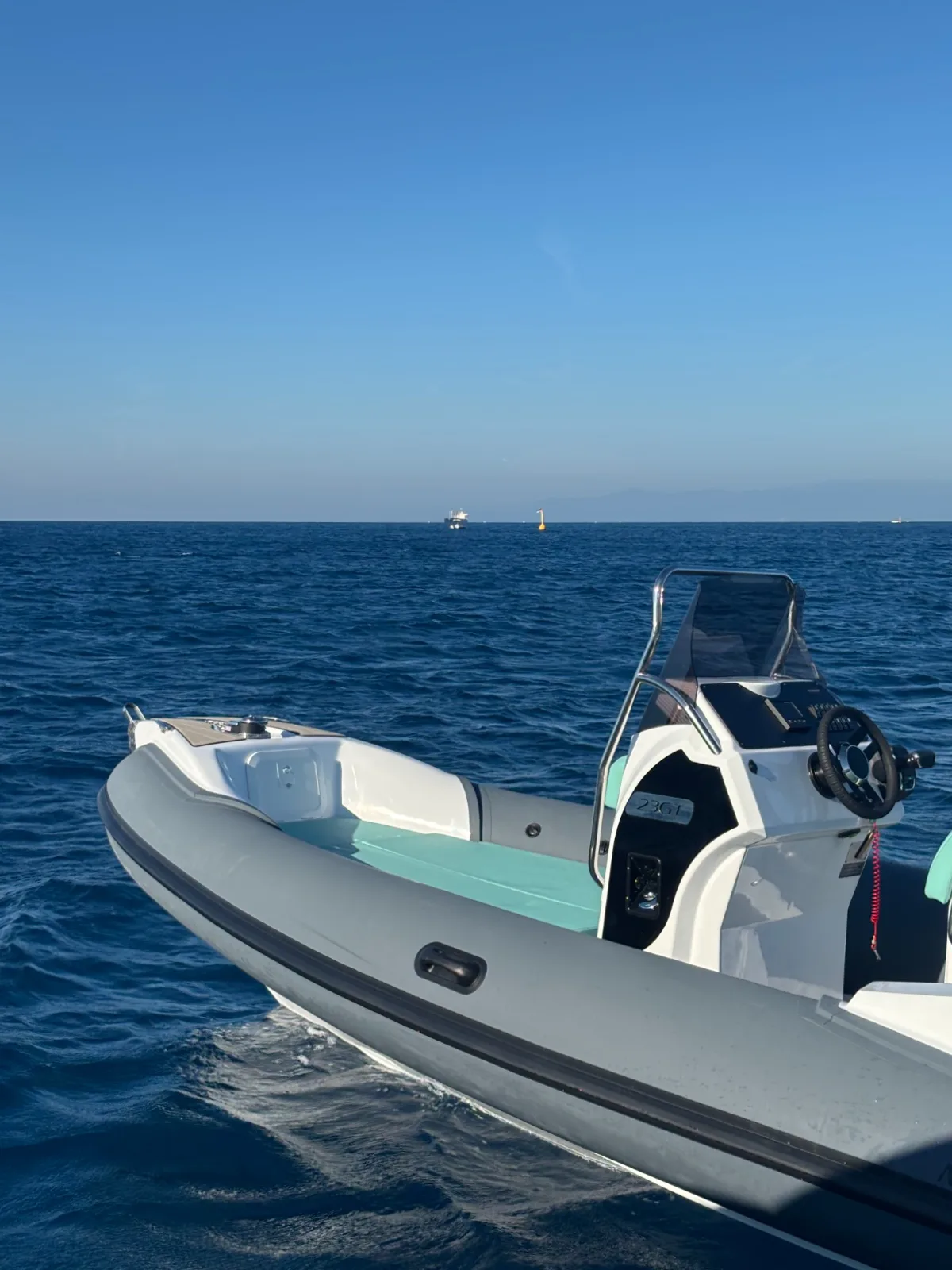 MV 23GT RIB bow and helm console at sea