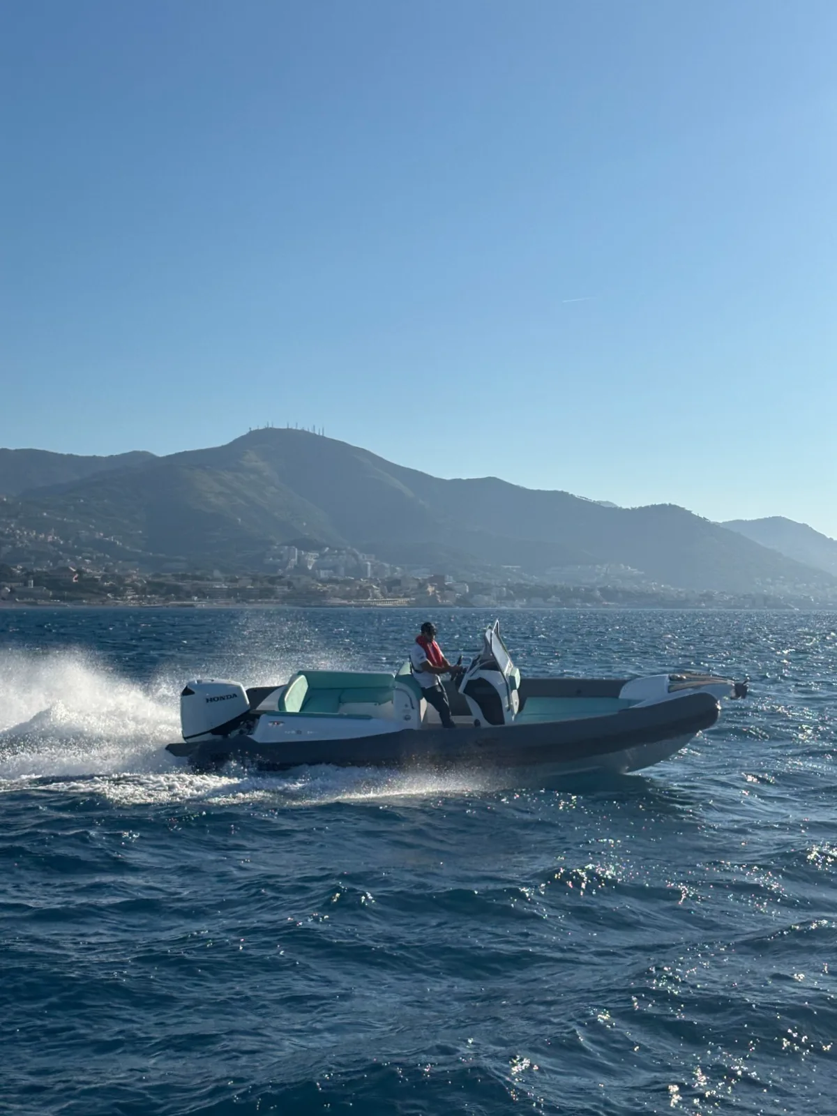 MV 23GT RIB at speed along the coast