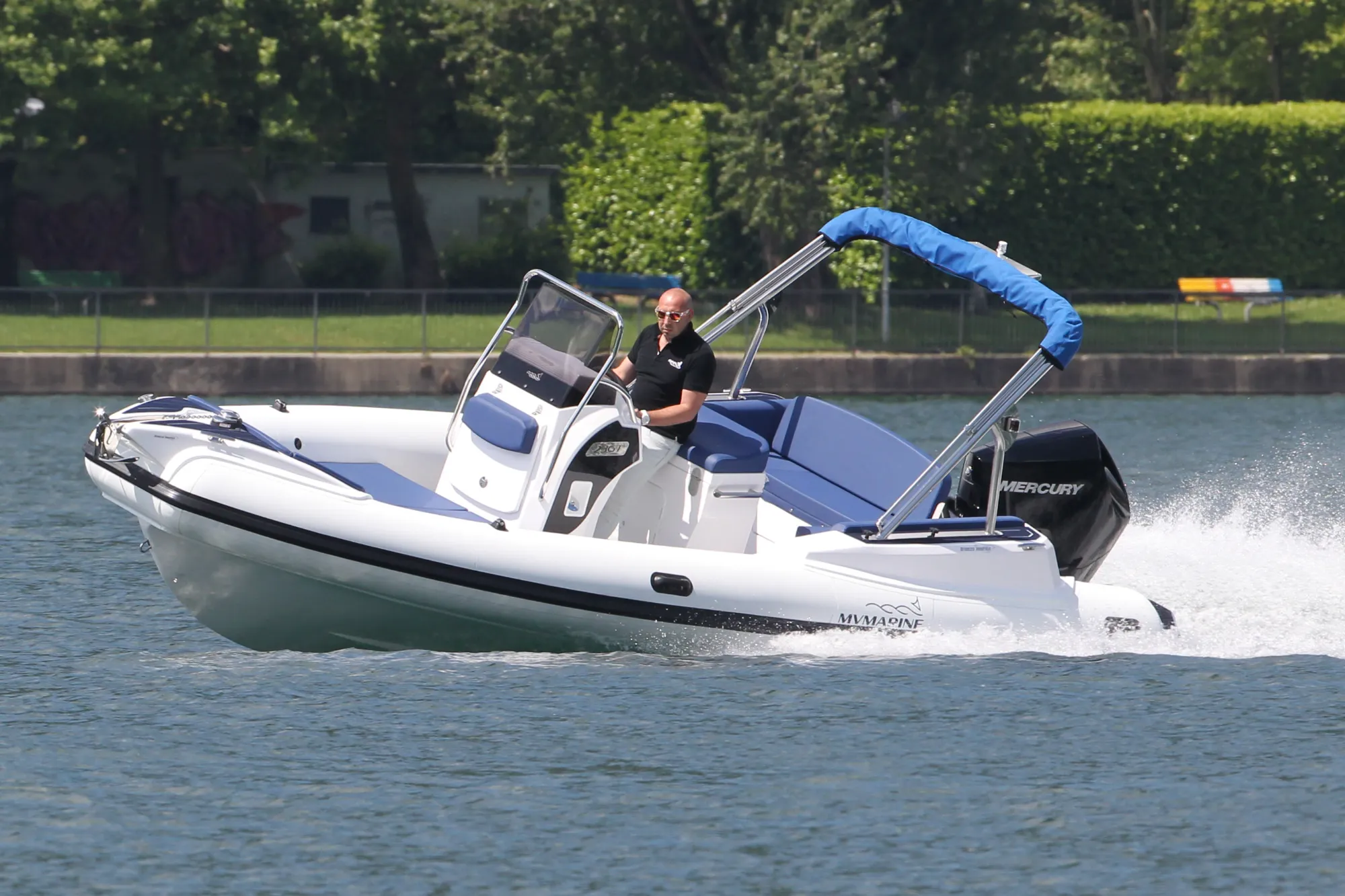 MV 23GT RIB cruising at speed with the bimini frame up